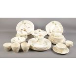 A quantity of Royal Doulton tea/dinnerware in the Coppice design. Including tureen, jug, cups &