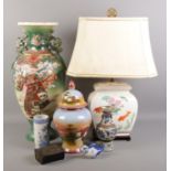 A small collection of oriental items, to include a large vase, table lamp, hinged lidded tray and