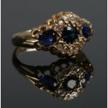 An Edwardian 18ct gold, sapphire and diamond ring. Assayed Birmingham 1906. Size N. 3.43g.
