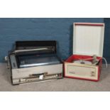 A 1960's Discomatic portable jukebox & Dansette Monarch portable record player. Will both need