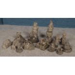 A collection of concrete garden ornaments. Includes animals, mermaid, gnome etc.