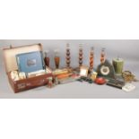 A large quantity of collectables, to include three pairs of wood turned candlesticks, small