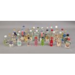 A selection of unopened alcoholic miniatures. To include Blue Curacao, Ouzo, Parfait Amour, Vodka,