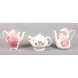 Three decorative teapots, to include Crown Ducal WWII 'War against Hitlerism' example.