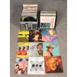 A carry case and large box of mostly rock and pop records. To include Rod Stewart, Madonna, Men at