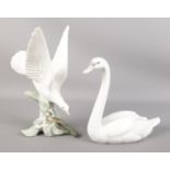 Two Lladro bird figures; 5230 swan and turtle dove. Tallest: 28cm.