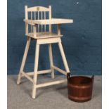A white painted wooden high chair, together with a small copper bound barrel.