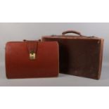 A vintage leather suitcase & briefcase. Suitcase: H: 33cm W:55cm D:13cm.