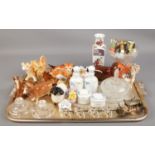 A tray of assorted items. Includes Crescent silver jubilee coach, ceramic animals, dressing table