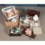 Four boxes of miscellaneous. Includes model aeroplanes, Monopoly, briefcase, shells, hip flask etc.