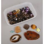 A collection of gem stones etc. Including agate slices, tigers eye, amethyst, turquoise.