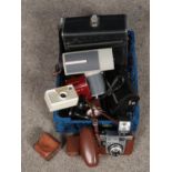 A collection of photographic equipment. Includes Eumig C10 Zoom, Agfa Silette I, Halina 202 etc.