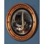 A gilt framed Mirrart convex mirror. 42cm diameter.