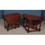Two small oak drop leaf occasional tables.
