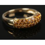 A 10ct gold and citrine coloured stone ring. Size P. 2.22g.