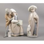 Two Nao figures. To include a young woman and man with dog and duck and shepherd with lamb. H: 26cm.