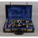 A cased Corton clarinet, with Calteau mouthpiece and accessories.