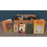 A box of assorted vintage books. Subjects to include photography, a Red guide to London, Gamages