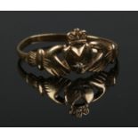 A 9ct gold ladies claddagh ring. Size N. 1g