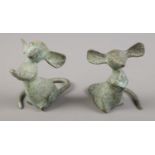 Two small bronze figures, modelled as mice.