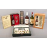 A collection of assorted whisky. To include Talisker 10 years 20cl in presentation case with two