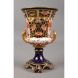 A Royal Crown Derby Imari Twin Handled Vase of Urn Form. Numbered 1202 and 6299. Stamped to the