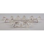 Nine Belgian Art Deco style silver knife rests with shell decoration. Five stamped for .800 fineness
