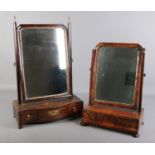 Two Regency mahogany toilet mirrors.