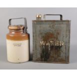 A WW2 military stoneware gas ointment jar with military can. Can is stamped 1955 with W D and