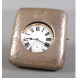 A white metal goliath pocket watch in silver easel case by Smith & Bartlam.
