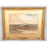 Wycliffe Egginton (1875-1951), a gilt framed watercolour, rural landscape with sheep and heather,