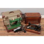Two sewing machines. Including cased singer example, etc.