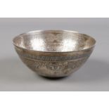 An Eastern silver bowl with etched decoration. 12cm diameter. 130g. Acid tests as silver.