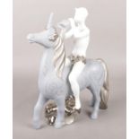 A Lladro limited edition ceramic figure group, Faun and Unicorn. Height 29.5cm. Good condition.