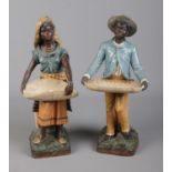 A pair of early 20th century Austrian terracotta figures. Both figures are modelled as Moorish