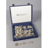 A large collection of pre 1947 silver coins. To include half crown, two shillings, one shilling,