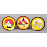A set of three Clarice Cliff by Wedgwood limited edition plates, from the 'Bizarre World of