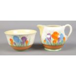 Two pieces of Royal Staffordshire Clarice Cliff. Cream jug and sugar bowl, both in the Autumn Crocus