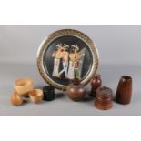 An assortment of wooden treen on an Egyptian tray. To include a Sycamore turned bowl, an Ash cup and