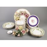 A box of assorted floral ceramics. To include a Capodimonte spray of roses, Paragon plates, and a