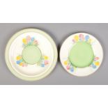 Two Clarice Cliff side plates in the Spring Crocus design. Diameter 19.5cm and 16.5cm.