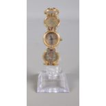An unusual Peers Hardy silver three pence ladies quartz watch, on yellow metal expanding strap.