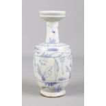 An antique Korean blue and white baluster shaped vase. 21.5cm.