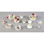 A quantity of ceramic floral posies & trinkets. To include Royal Albert 'Old Country Roses' &
