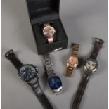 Five wristwatches. Includes boxed Jones example, Fossil, Michael Kors etc.