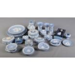 A collection of blue Wedgwood jasperware.