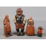 Four carved and painted Austrian figures. To include an small match container in the form of an open