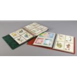 Two large albums containing a collection of Royal Mail postcards (approximately 350).