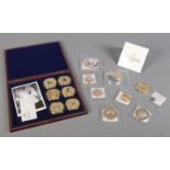 A collection of Windsor Mint commemorative coins. To include Greatest British Sovereigns coin set,