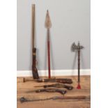 A collection of assorted display weapons. To include a Spear, pistols, flail and axe etc.